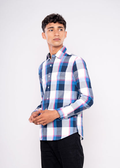 Man wearing a plaid shirt with a white background